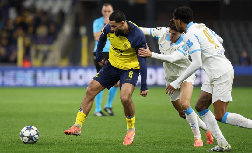 Union's Adem Zorgane and Marseille's Nayef Aguerd fight for the ball during a soccer game between Belgian Royale Union Saint-Gilloise and French Olympique de Marseille, on Tuesday 09 December 2025 in Brussels, on the sixth day of the League phase of the UEFA Champions League tournament. BELGA PHOTO VIRGINIE LEFOUR
