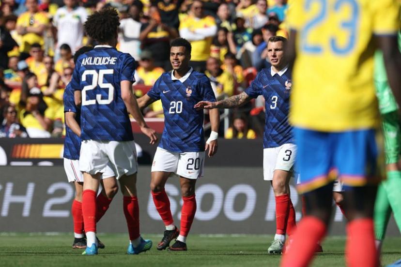 France's forward #20 Desire Doue is congratulated by teammates after scoring his second goal during a friendly football match between Colombia and France at Northwest Stadium in Landover, Maryland, on March 29, 2026.  FRANCK FIFE / AFP