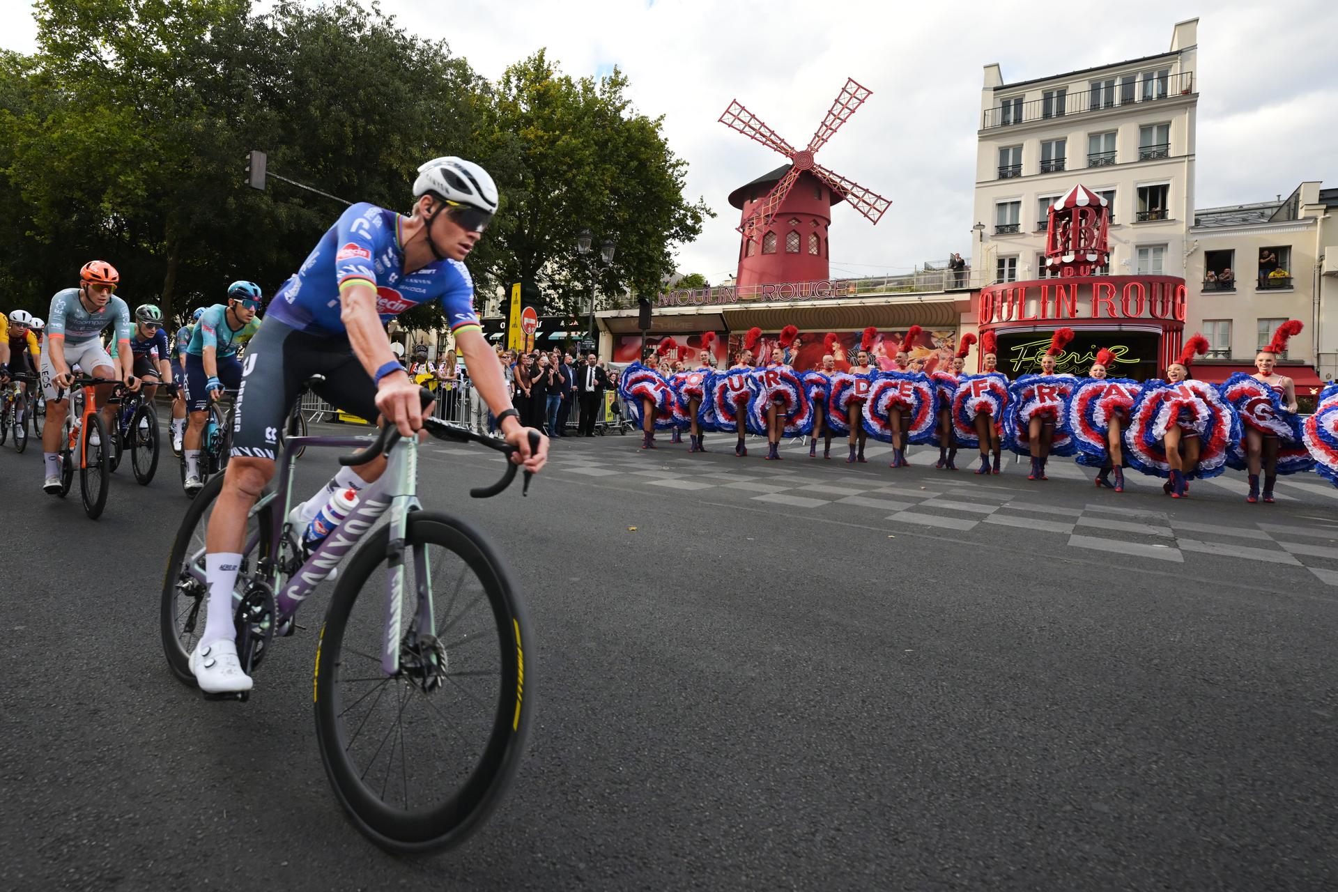 Dutch Mathieu van der Poel of Alpecin-Premier Tech pictured in front of The Moulin Rouge during stage 21 of the 2026 Tour de France cycling race, a stage of 130km from Thoiry to Paris Champs-Elysees , on Sunday 26 July 2026. The 113th edition of the Tour de France starts on Saturday 4 July in Barcelona, Spain, and will finish in Paris, France on the 26th of July. BELGA PHOTO DAVID PINTENS
