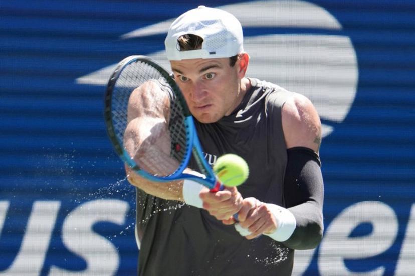 Britain's Jack Draper plays a return to Argentina's Federico Agustin Gomez during their men's singles first round tennis match on day two of the US Open tennis tournament at the USTA Billie Jean King National Tennis Center in New York City, on August 25, 2025.  TIMOTHY A. CLARY / AFP