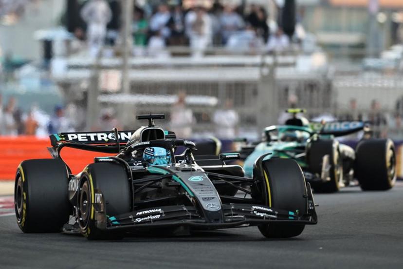Mercedes' British driver George Russel competes during the Abu Dhabi Formula One Grand Prix at the Yas Marina Circuit in Abu Dhabi on December 7, 2025.  Fadel SENNA / AFP