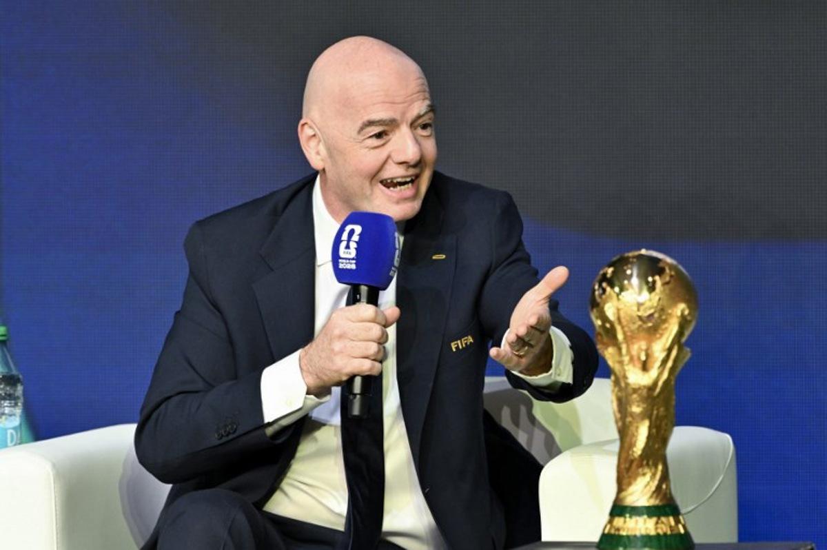 FIFA President Gianni Infantino speaks during the FIFA World Cup 2026 official match schedule announcement in Washington, DC, on December 6, 2025.  Roberto SCHMIDT / AFP