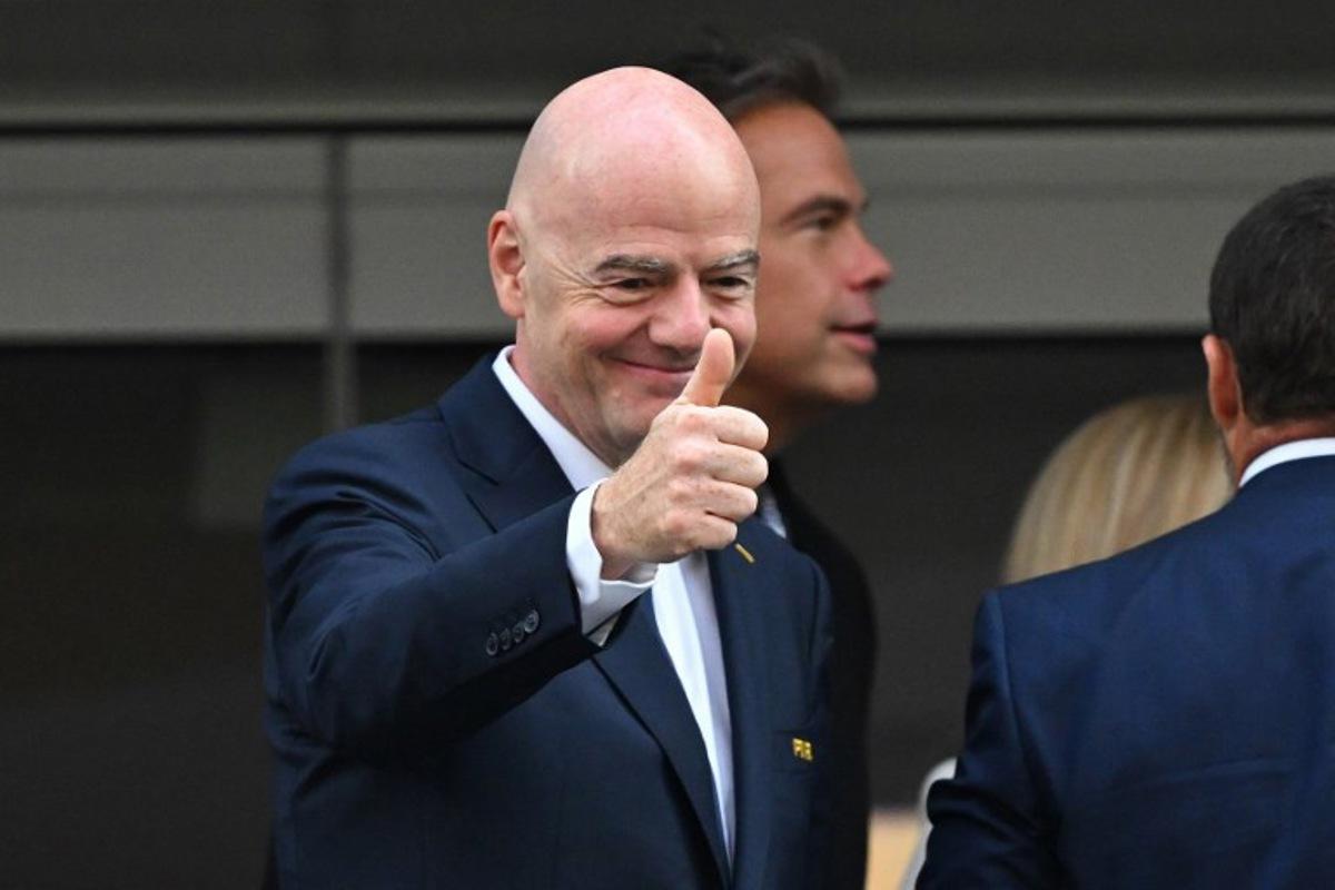 FIFA president Gianni Infantino gives a thumbs up ahead of the 2026 World Cup Group D football match between USA and Paraguay at the Los Angeles Stadium in Inglewood on June 12, 2026.  Patrick T. Fallon / AFP