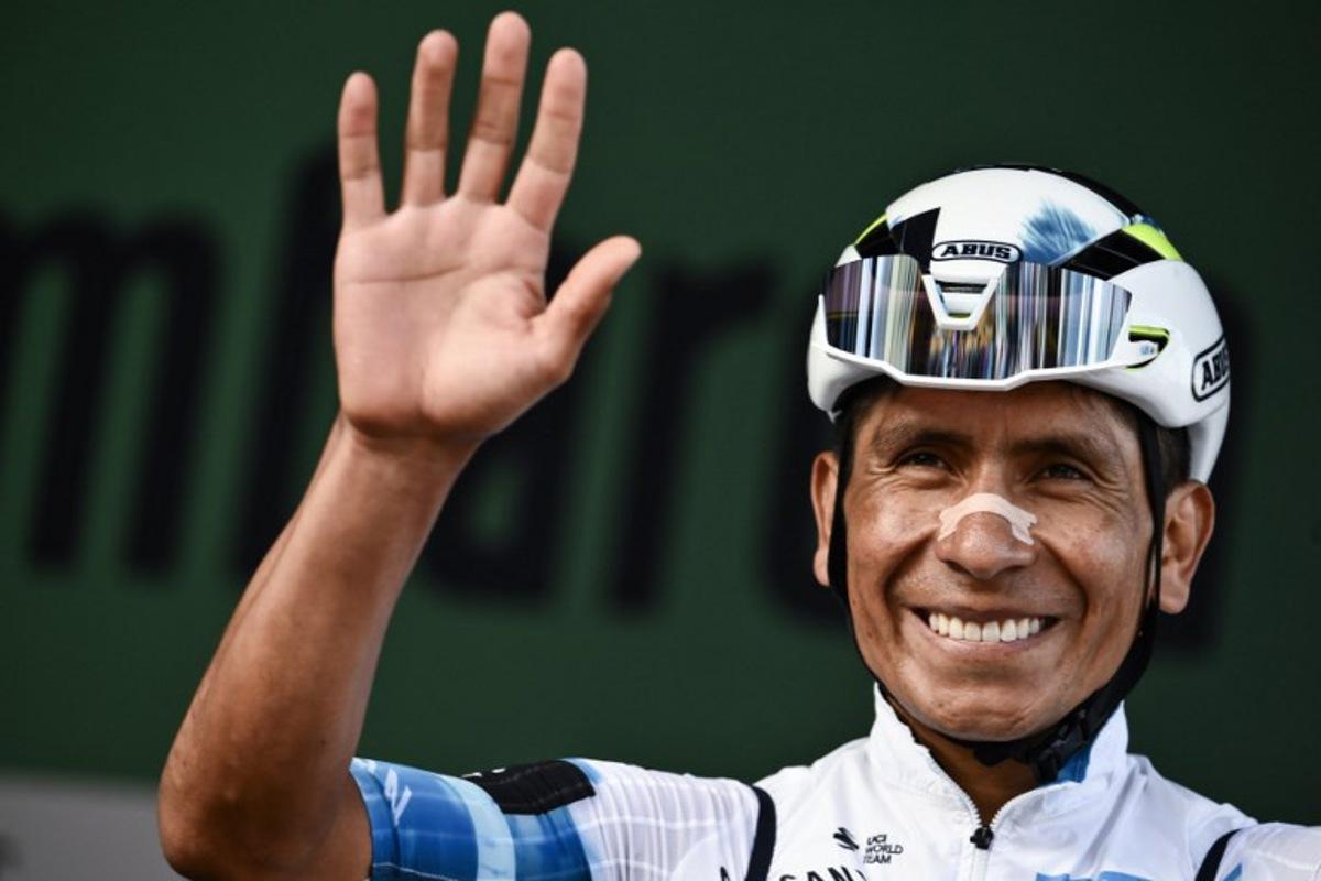 Movistar Team's Colombian riderNairo Quintana looks on from the sign-in podium ahead of the 119th edition of the Giro di Lombardia (Tour of Lombardy), a 238km cycling race from Como to Bergamo on October 11, 2025.  Marco BERTORELLO / AFP