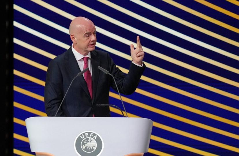 FIFA President Gianni Infantino gestures as he addresses the 50th UEFA Ordinary Congress in Brussels on February 12, 2026.   Pau BARRENA / AFP