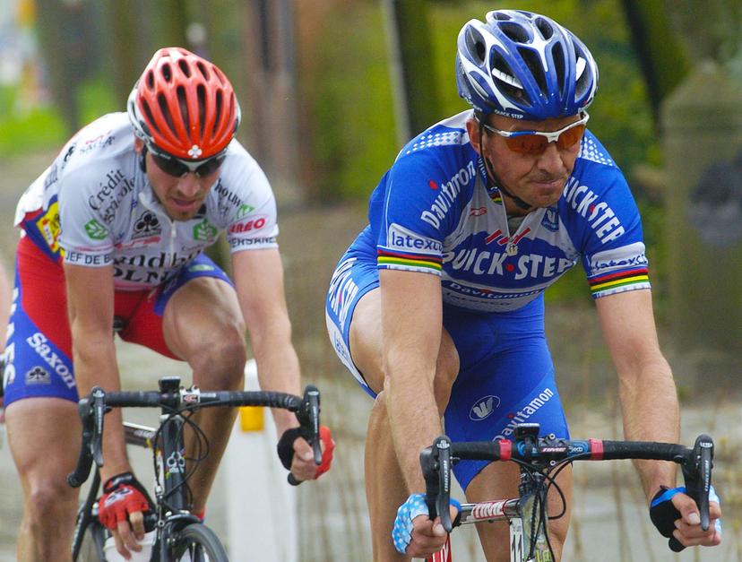 BRU167 - 20040414 - SCHOTEN, BELGIUM : Yohan Museeuw (R) and Ludo Dierckxsens (L) ride during the Scheldeprijs cycling race, Wednesday 14 April 2004, in Schoten.  BELGA PHOTO BENOIT DOPPAGNE