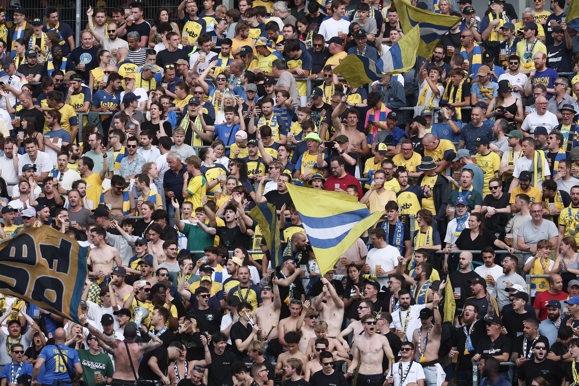 Union's supporters pictured at the start of a soccer match between Royale Union Saint-Gilloise and Club Brugge KV, Sunday 20 July 2025 in Brussels, the 'Super Cup' where the Champions of the Jupiler Pro League Brugge meets the winner of the Croky Cup Union. BELGA PHOTO BRUNO FAHY