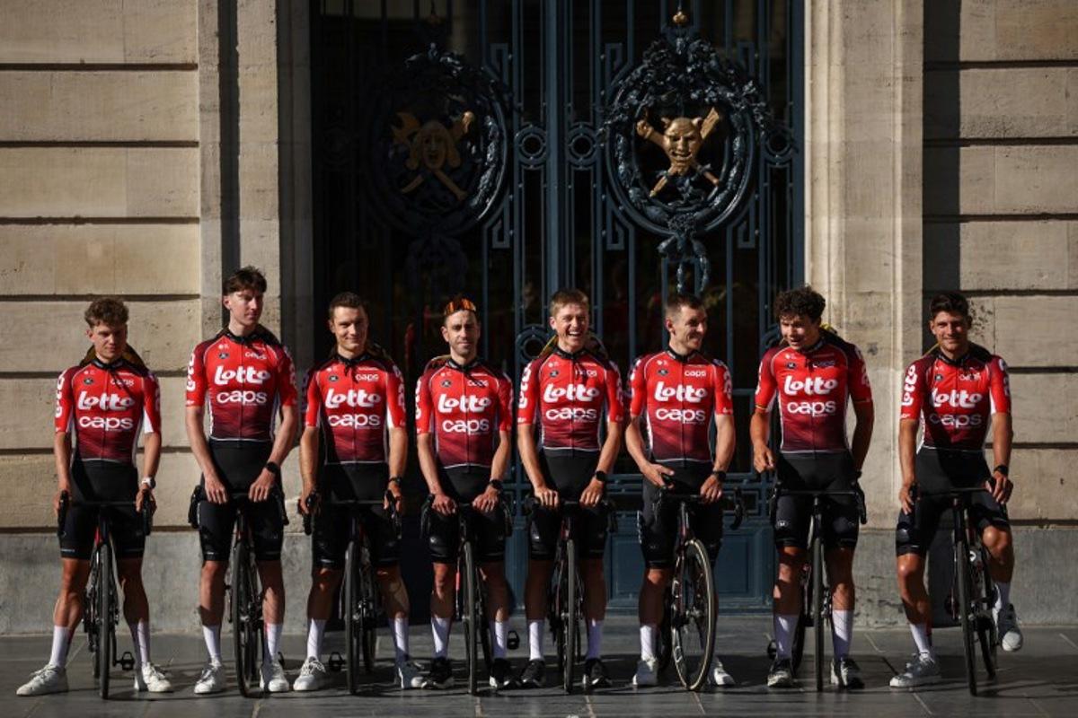 Lotto team's Belgian rider Lennert Van Eetvelt, Lotto team's Australian rider Jarrad Drizners, Lotto team's Belgian rider Sebastien Grignard, Lotto team's Argentine rider Eduardo Sepulveda, Lotto team's Belgian rider Jenno Berckmoes , Lotto team's Belgian rider Jasper De Buyst, Lotto team's Belgian rider Arnaud De Lie and Lotto team's Belgian rider Brent Van Moer pose during the official teams presentation days prior to the start of the 112th edition of the Tour de France cycling race, in Lille, northern France, on July 3, 2025.  Anne-Christine POUJOULAT / AFP