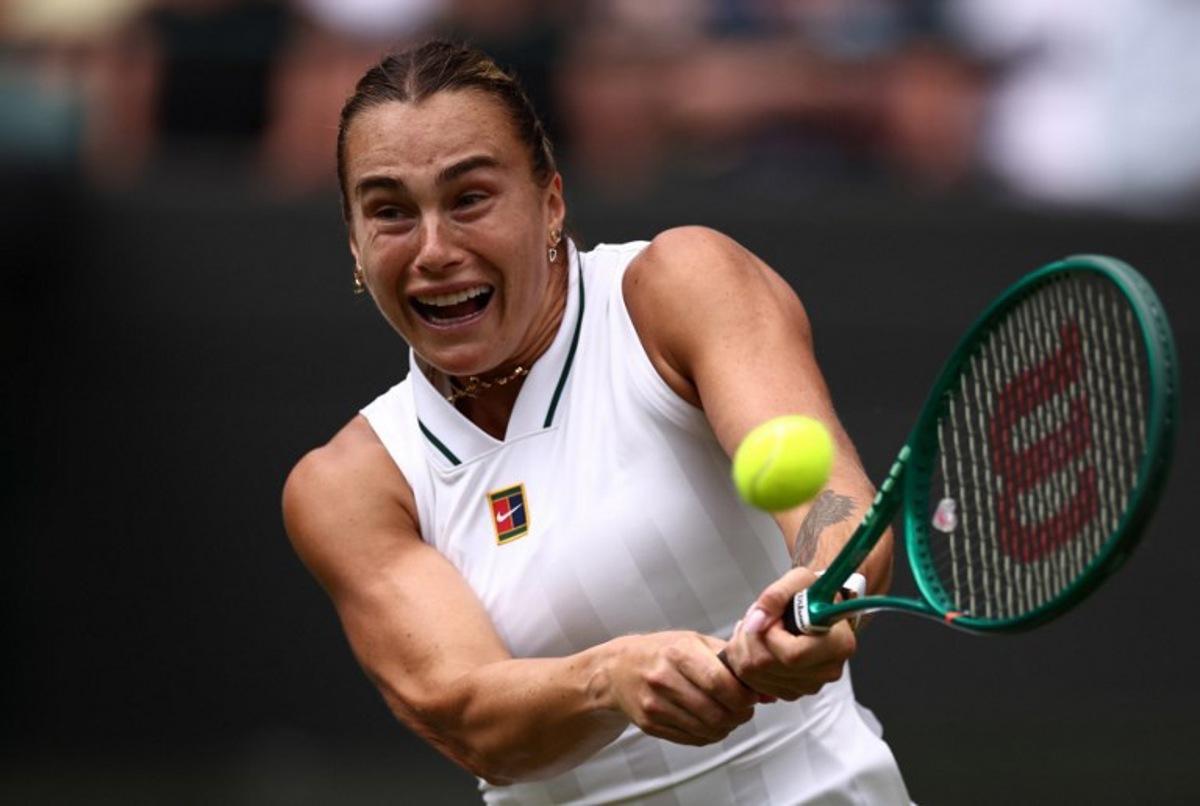 Belarus's Aryna Sabalenka returns to US player McCartney Kessler during their women's singles second round tennis match on the third day of the 2026 Wimbledon Championships at The All England Lawn Tennis and Croquet Club in Wimbledon, southwest London, on July 1, 2026.  HENRY NICHOLLS / AFP