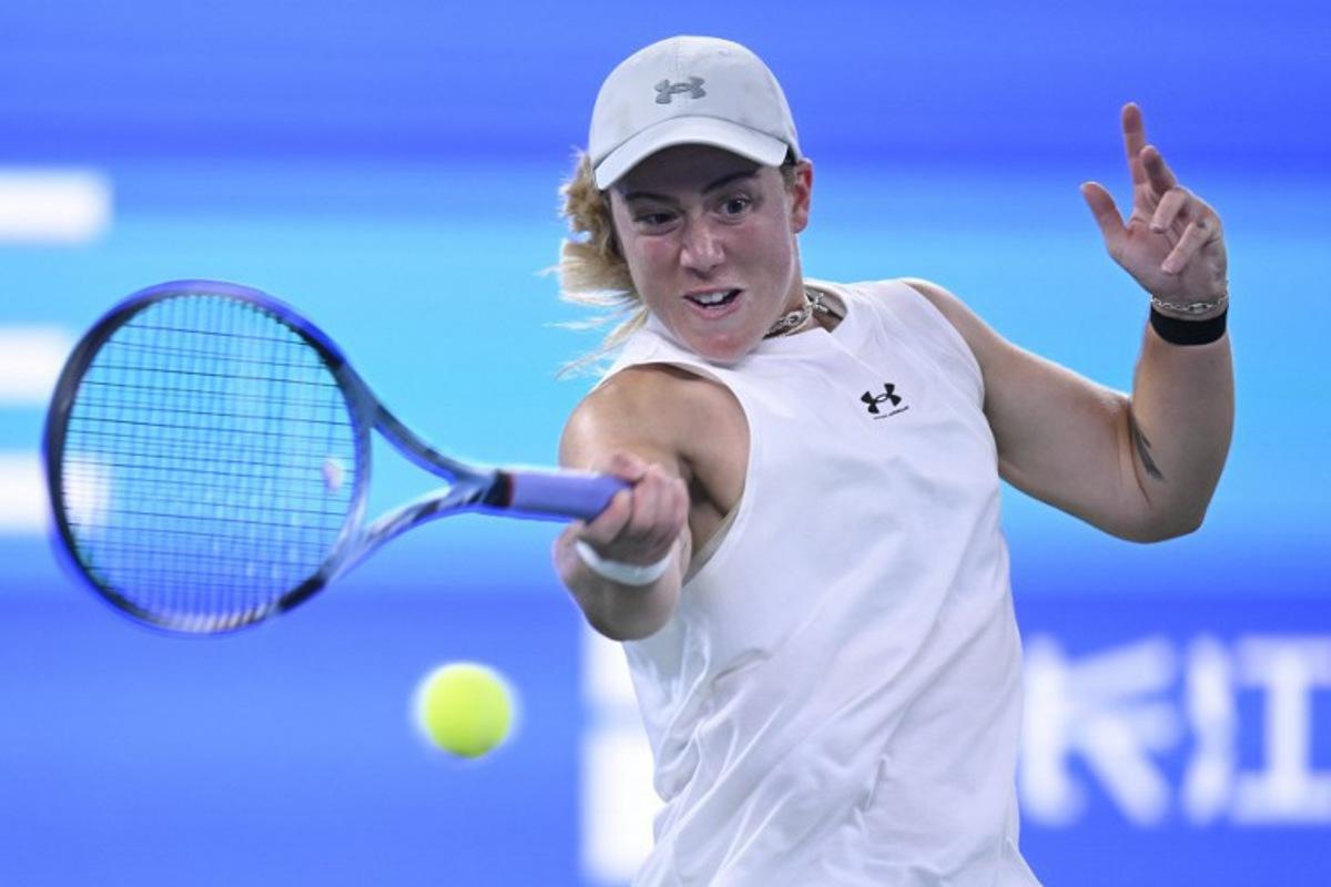 Britain's Sonay Kartal hits a return to Ukraine's Elina Svitolina during the women's singles quarter final match at the Wuhan Open tennis tournament in Wuhan, China's Hubei province on October 16, 2026. WANG Zhao / AFP