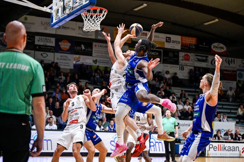 Kortrijk's Leon Stergar and Mechelen's Zaba Bangala pictured in action during a basketball match between Kangoeroes Mechelen and House of Talents Spurs Kortrijk, Wednesday 02 April 2025 in Mechelen, on day 30 of the 'BNXT League' Belgian/ Dutch first division basket championship. BELGA PHOTO TOM GOYVAERTS