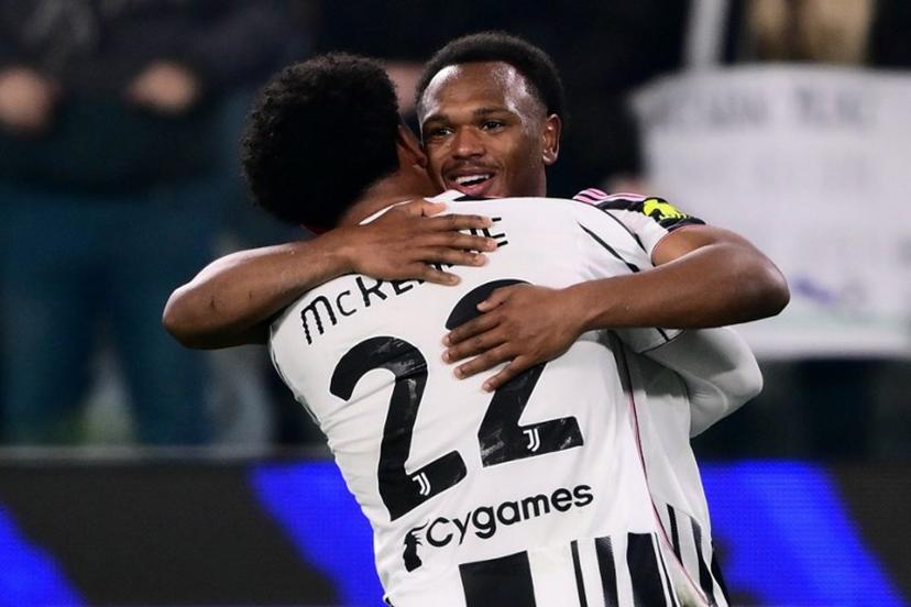 Juventus' Belgian forward #20 Lois Openda (R) celebrates after scoring Juventus's second goal with Juventus' US midfielder #22 Weston McKennie (L) during the Italian Serie A football match between Juventus and AS Roma at the Allianz stadium in Turin, northern Italy, on December 20, 2025.  MARCO BERTORELLO / AFP