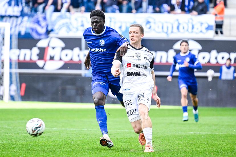 Gent's Ibrahima Cisse and STVV's Robert-Jan Vanwesemael pictured in action during a soccer match between KAA Gent and Sint-Truidense V.V., Sunday 19 April 2026 in Gent, on the third day of the Champion's Play-offs (PO1) of the 2025-2026 'Jupiler Pro League' first division of the Belgian championship. BELGA PHOTO TOM GOYVAERTS
