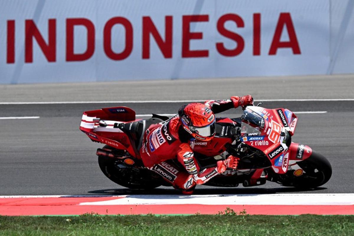 Ducati Lenovo Team rider Marc Marquez of Spain takes part in a free practice ahead of the MotoGP Indonesian Grand Prix at the Mandalika International Circuit in Mandalika on October 9, 2026.  SONNY TUMBELAKA / AFP
