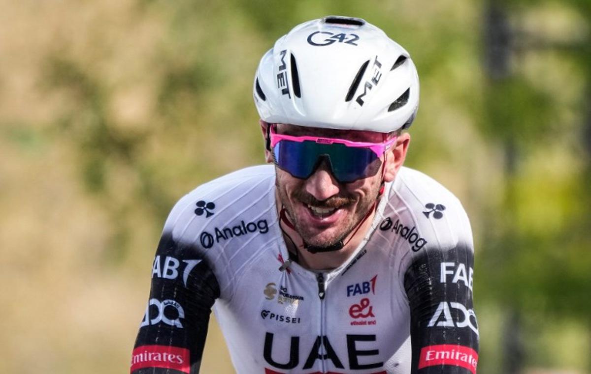 American Brandon McNulty, of UAE Team Emirates XRG, crosses the finish line during the 14th Grand Prix Cycliste de Montreal cycling road race in Montreal, Canada, on September 14, 2025.   MATHIEU BELANGER / AFP