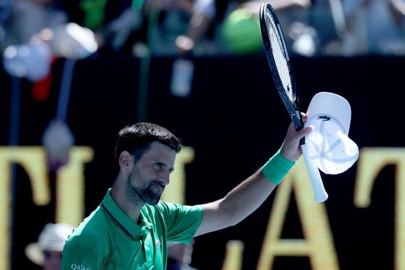 Serbia's Novak Djokovic celebrates victory over Italy's Francesco Maestrelli after their men's singles match on Day 5 of the Australian Open tennis tournament in Melbourne on January 22, 2026.  DAVID GRAY / AFP