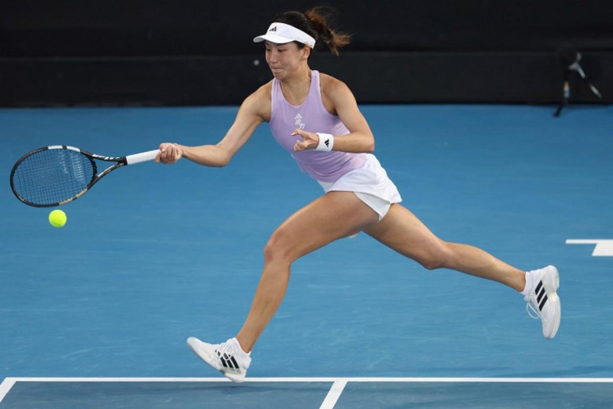 Wang Xinyu of China hits a return to Alexandra Eala of the Philippines during their women's singles semi-final match at the WTA Auckland Classic tennis tournament in Auckland on January 10, 2026.  Michael Bradley / AFP