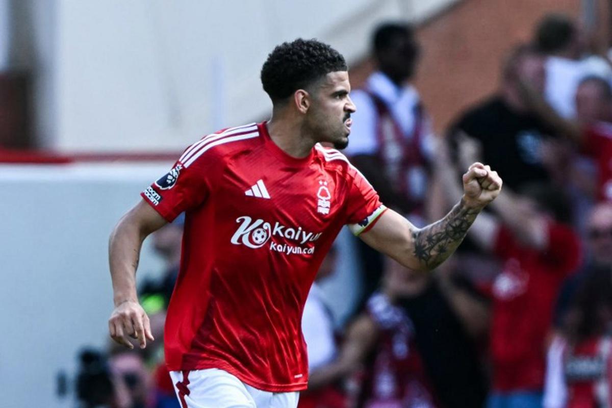 Nottingham Forest's English midfielder #10 Morgan Gibbs-White celebrates after scoring his team first goal during the English Premier League football match between Nottingham Forest and Leicester City at The City Ground in Nottingham, central England, on May 11, 2025.  JUSTIN TALLIS / AFP