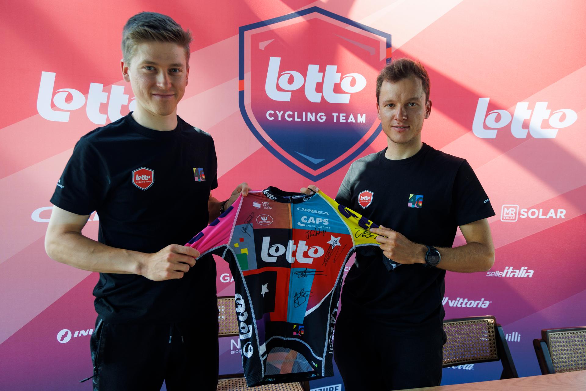 Belgian Jenno Berckmoes of Lotto Cycling Team and Belgian Arjen Livyns of Lotto Cycling Team pictured during a press conference of the Lotto Cycling Team ahead of the Ronde van Vlaanderen / Tour des Flandres / Tour of Flanders cycling race, Friday 04 April 2025 in Sint-Martens-Latem. The 109th edition of the cycling race will take place on Sunday 06 April. BELGA PHOTO NICOLAS MAETERLINCK