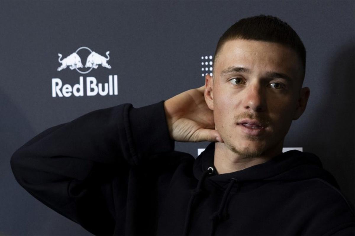 Red Bull-Bora-Hansgrohe's Belgium rider Remco Evenepoel speaks during a press conference in the media day of their new team in Binissalem on Mallorca Island on December 10, 2025.  Jaime REINA / AFP