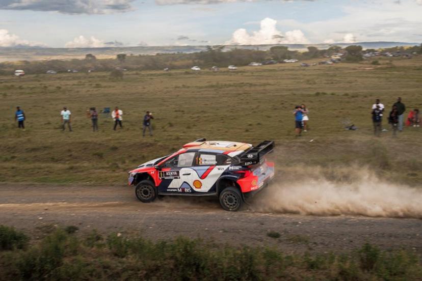 Hyundai Shell Mobis World Rally Team's Belgian driver Thierry Neuville steers his Hyundai i20 N Rally1 with Belgian co-driver Martijn Wydaeghe during the World Rally Championship (WRC) Safari Rally Kenya Special Stage 6 in Naivasha on March 21, 2025.  Tony KARUMBA / AFP