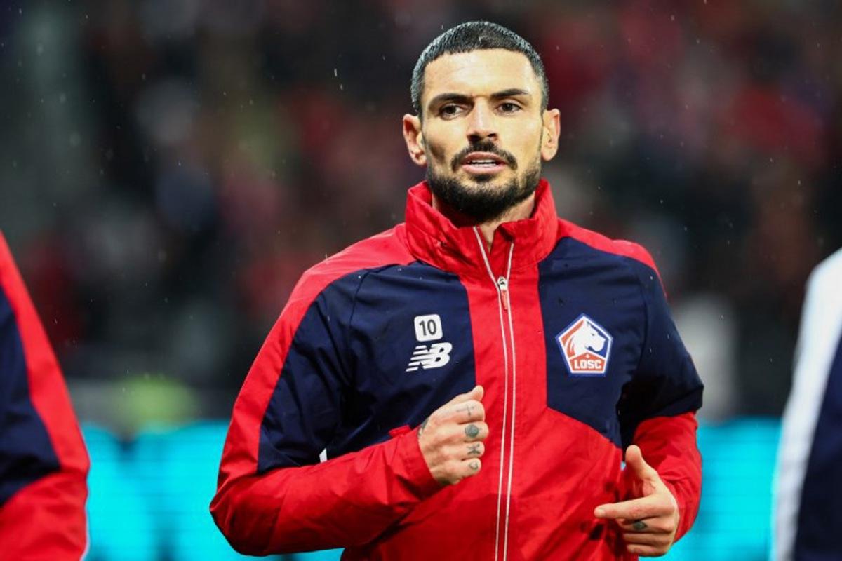 Lille's French midfielder #10 Remy Cabella warms up prior to the UEFA Champions League, league phase - matchday 8 football match between Lille OSC (LOSC) and Feyenoord Rotterdam at the Stade Pierre-Mauroy in Villeneuve-d'Ascq in Northern France, on January 29, 2025.  Sameer Al-Doumy / AFP