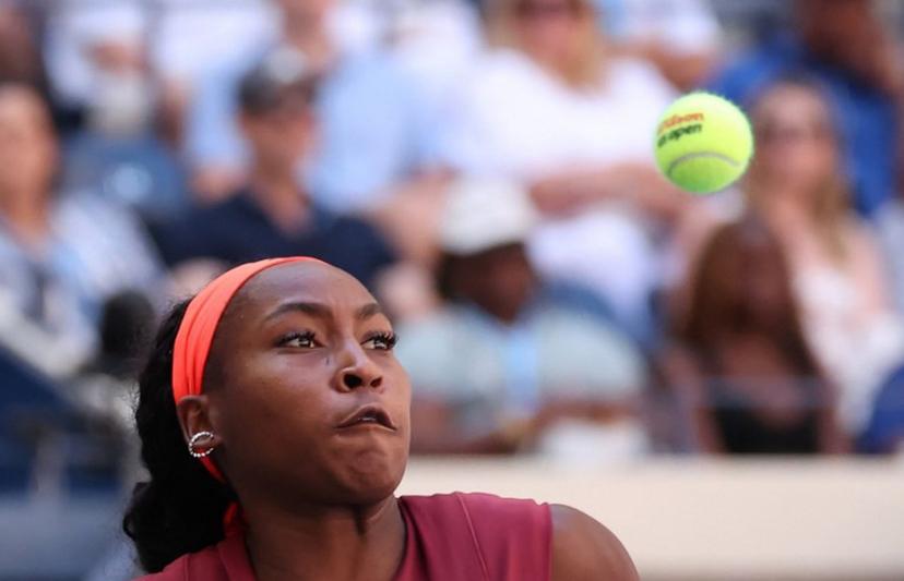 USA's Coco Gauff plays a shot to Poland's Magdalena Frech during their women's singles third round match on day seven of the US Open tennis tournament at the USTA Billie Jean King National Tennis Center in New York City on August 30, 2025.  TIMOTHY A.CLARY / AFP