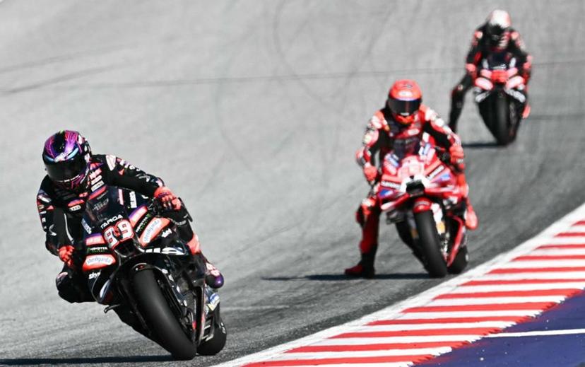 Aprilia Racing's Spanish driver Jorge Martin (L) and Ducati Lenovo Team's Spanish driver Marc Marquez compete during the Sprint event of the Grand Prix of Austria MotoGP in Spielberg bei Knittelfeld, Austria, on September 19, 2026.  Joe Klamar / AFP