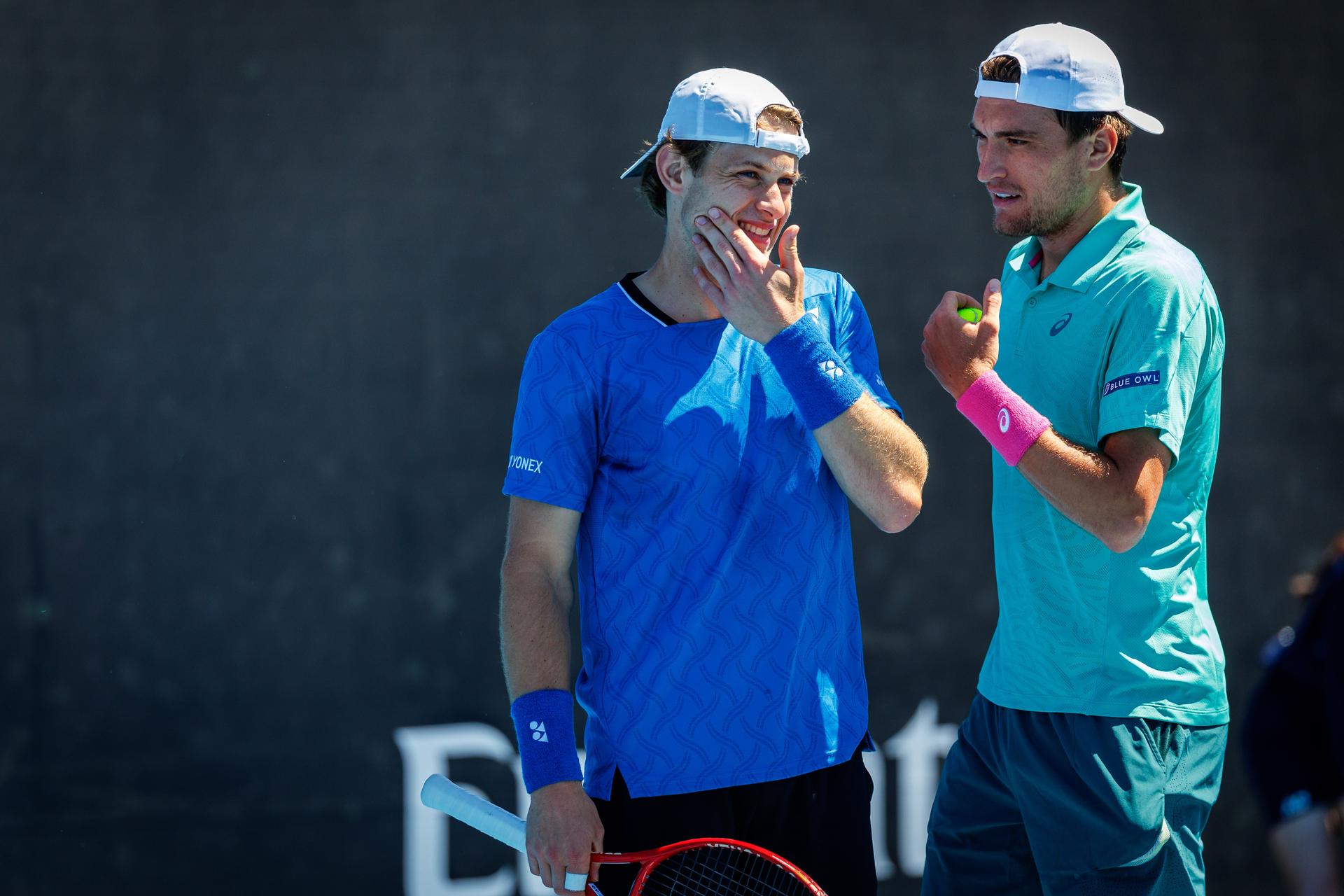 Belgian Zizou Bergs and Belgian Raphael Collignon pictured during a first round match of Belgium's Bergs/Collignon against Australia's pair McCabe/Tu in the men doubles at the Australian Open, Melbourne Park, Melbourne on Wednesday 21 January 2026. McCabe/Tu won the game. BELGA PHOTO PATRICK HAMILTON  --- BENELUX ONLY   ---