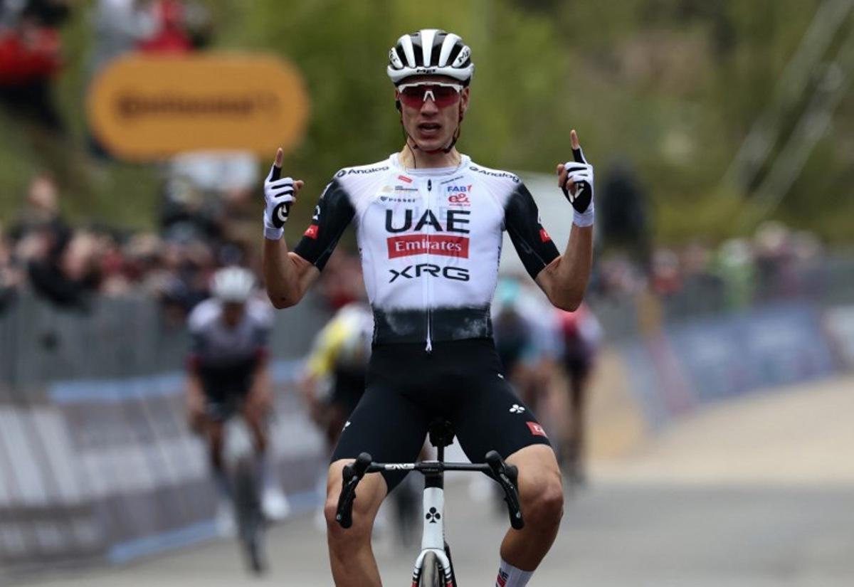 UAE Team Emirates XRG's Spanish rider Juan Ayuso celebrates after victory as he crosses the finish of the 7th stage of the 108th Giro d'Italia cycling race 168kms from Castel di Sangro to Tagliacozzo on May 16, 2025.  Luca Bettini / AFP