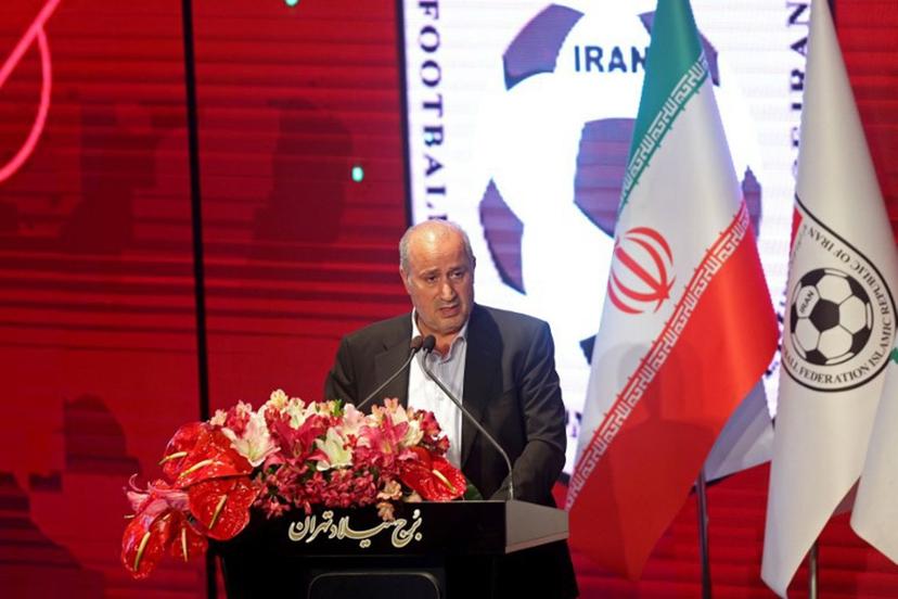 President of the Iranian Football Federation Mehdi Taj speaks during a ceremony in which the new jersey to be used by the Iranian national football team in the upcoming FIFA 2022 Qatar World Cup is unveiled, at Milad Tower in Tehran, on November 8, 2022.  ATTA KENARE / AFP