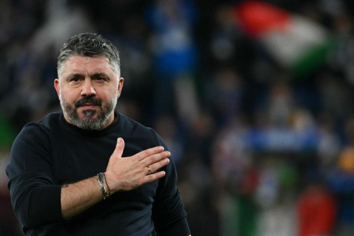 Italy's headcoach Gennaro Gattuso greets supporters after winning the play-off FIFA World Cup 2026 European qualification semi-final football match between Italy and North Ireland at the Gewiss stadium in Bergamo, on March 26, 2026.   Alberto PIZZOLI / AFP