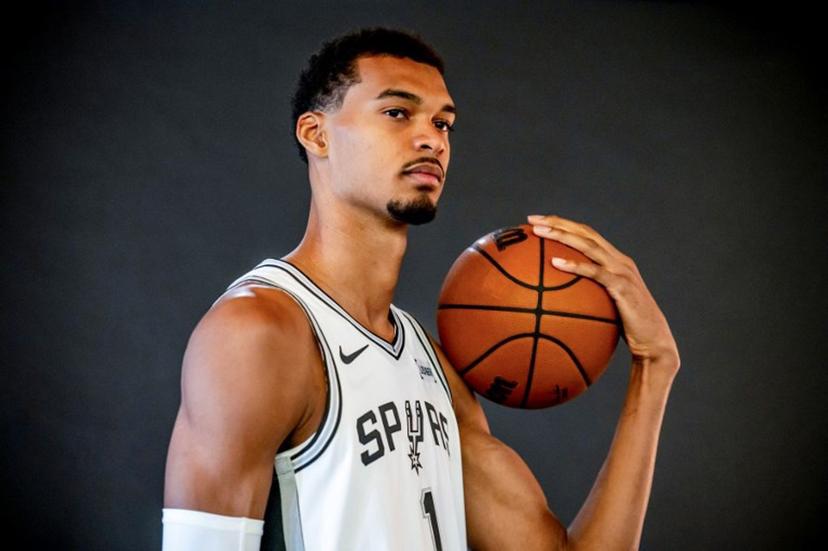 (FILES) French basketball player Victor Wembanyama poses for promotional photos during the San Antonio Spurs media day at the Victory Capital Performance Center in San Antonio, Texas on September 29, 2025. San Antonio Spurs superstar Victor Wembanyama said on January 27, 2026, he was "horrified" by unrest in Minneapolis, where two civilians have been shot dead by federal agents during the Trump administration's immigration crackdown.  SERGIO FLORES / AFP