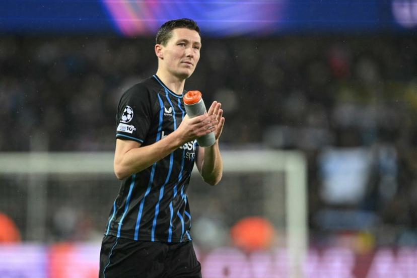 Club Brugge's Belgian midfielder #20 Hans Vanaken reacts at the end of the UEFA Champions League knockout round play-off first leg football match between Club Brugge and Atletico Madrid at the Jan Breydel Stadium in Brugge on February 18, 2026.  NICOLAS TUCAT / AFP