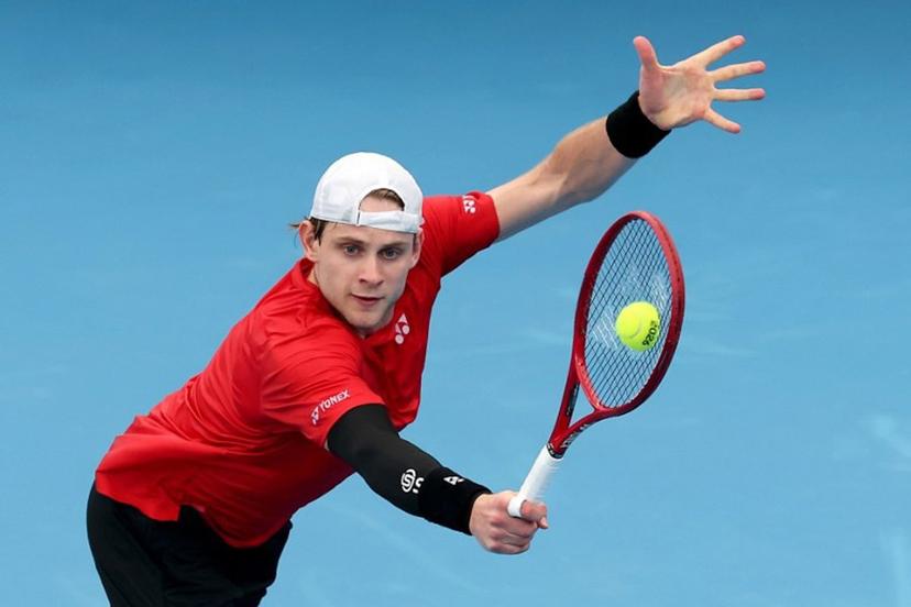 Belgium's Zizou Bergs hits a return to China's Zhang Zhizhen during their men's singles match at the United Cup tennis tournament on Ken Rosewall Arena in Sydney on January 3, 2026.  DAVID GRAY / AFP
