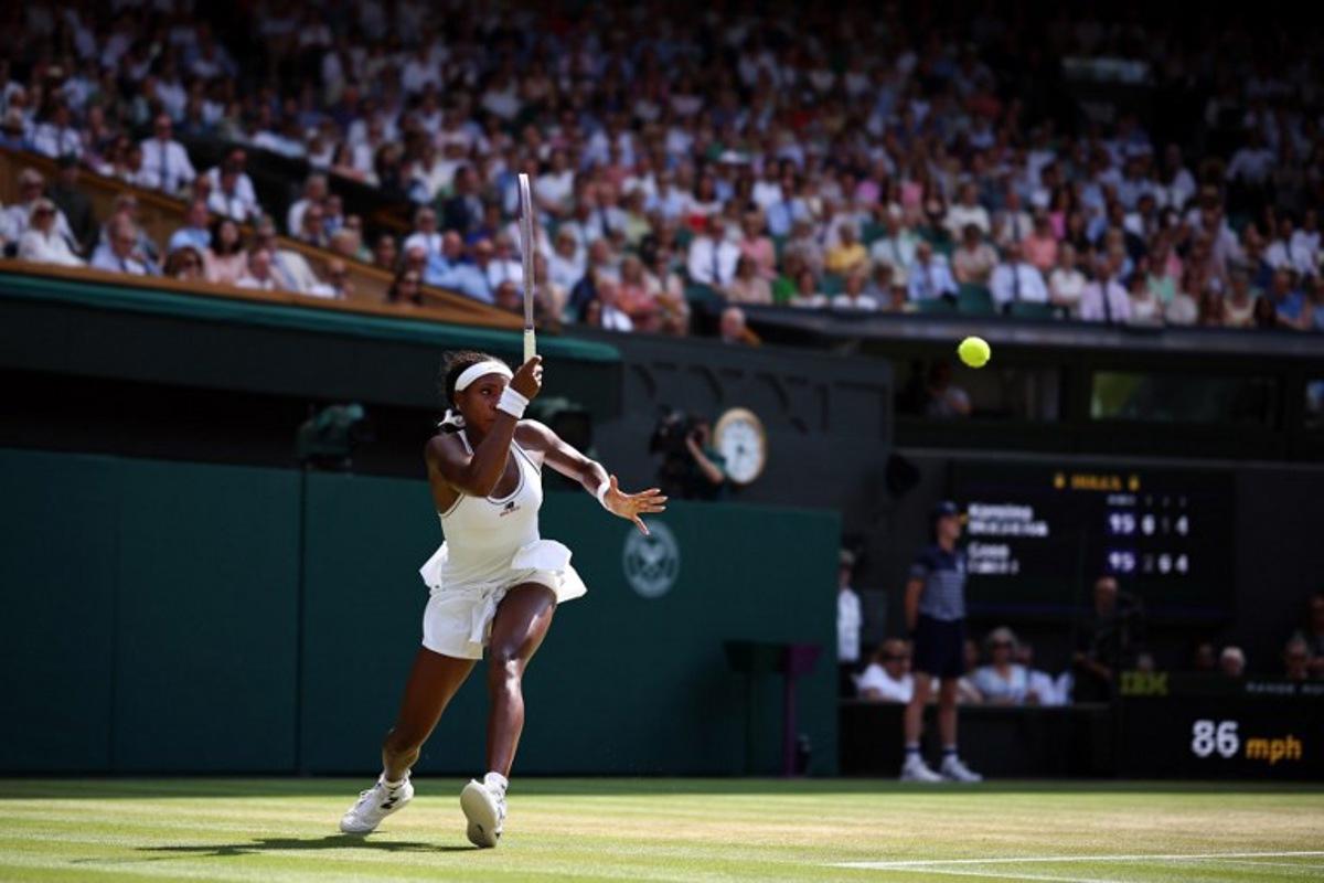 US player Coco Gauff returns to Czech Republic's Karolina Muchova during their women's singles semi-final tennis match on the eleventh day of the 2026 Wimbledon Championships at The All England Lawn Tennis and Croquet Club in Wimbledon, southwest London, on July 9, 2026.  Henry NICHOLLS / AFP