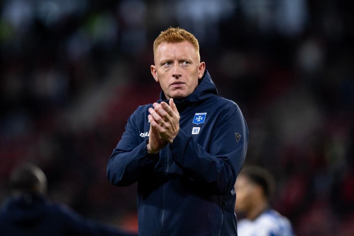 Auxerre's English headcoach Will Still acknowledges the crowd at the end of the French L1 football match between Stade Rennais FC and AJ Auxerre at the Roazhon Park Stadium in Rennes, western France on October 11, 2026.  Guillaume SALIGOT / AFP