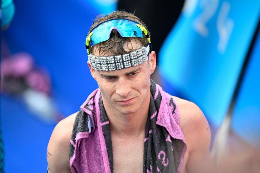 Belgian Marten Van Riel reacts after the men's individual triathlon race at the Paris 2024 Olympic Games, on Wednesday 31 July 2024 in Paris, France. The Games of the XXXIII Olympiad are taking place in Paris from 26 July to 11 August. The Belgian delegation counts 165 athletes competing in 21 sports. BELGA PHOTO JASPER JACOBS