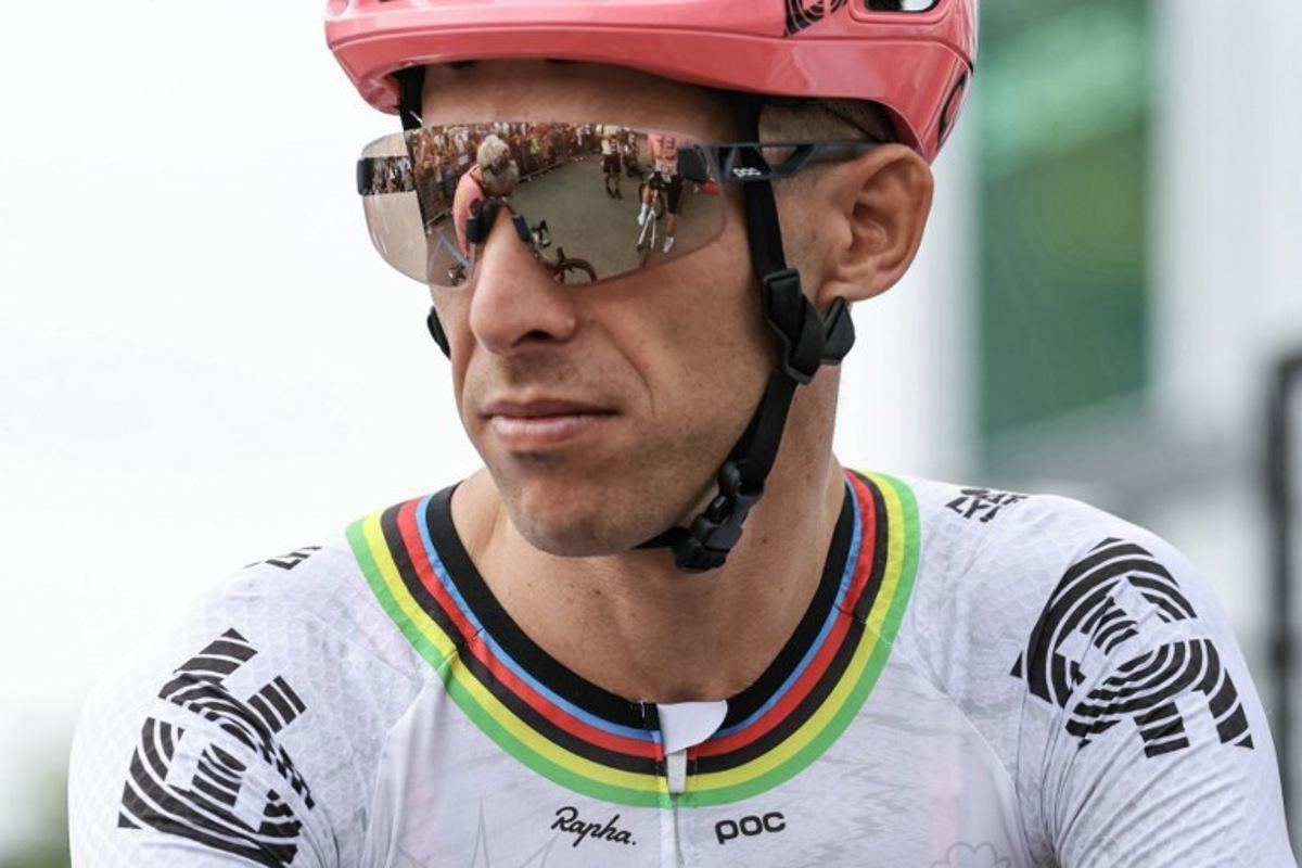 EF Education - EasyPost team's Portuguese rider Rui Costa looks on at the start of the 3rd stage of the 111th edition of the Tour de France cycling race, 230,5 km between Piacenza and Turin, on July 1, 2024.  Thomas SAMSON / AFP
