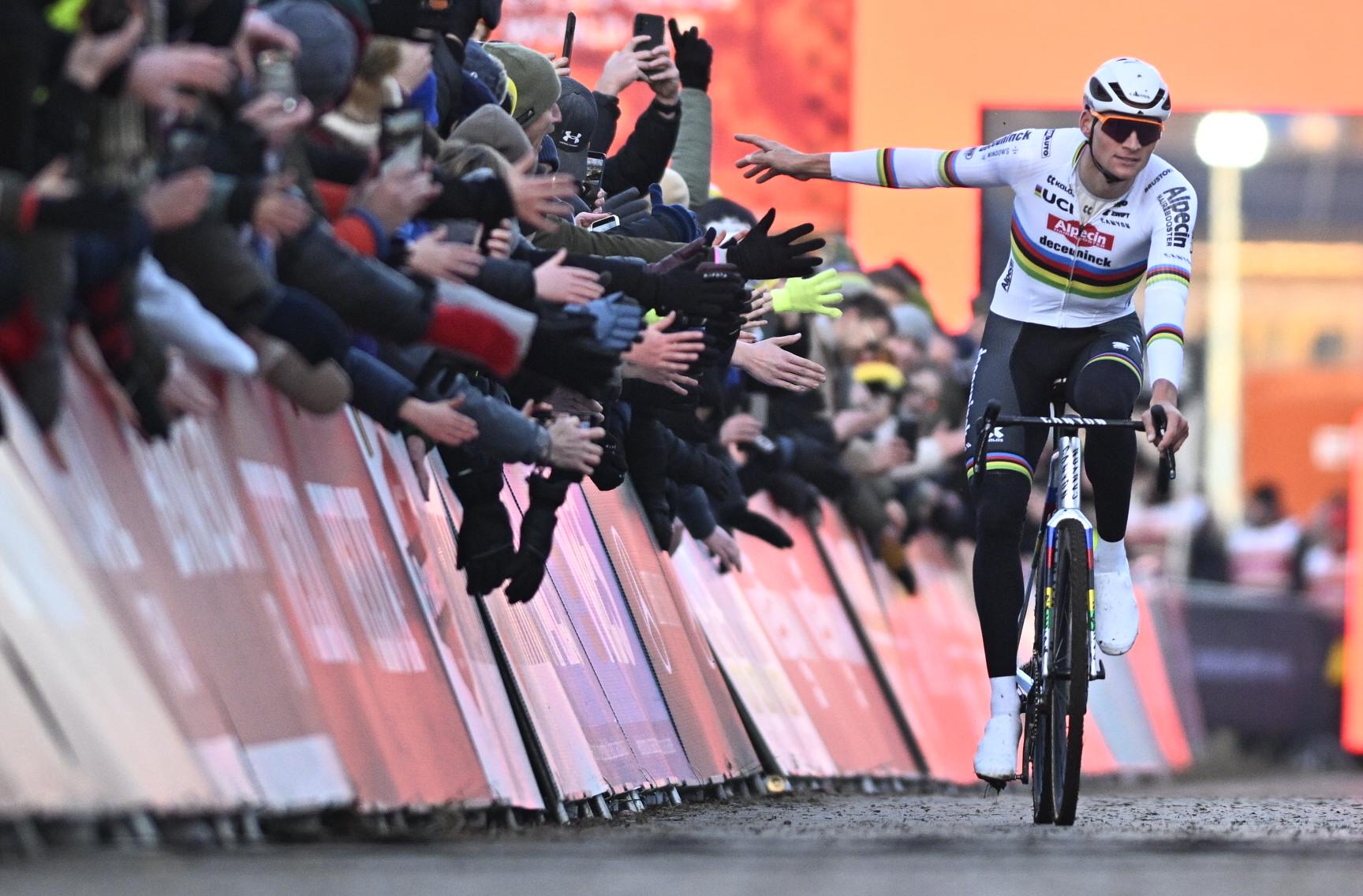 Dutch Mathieu Van Der Poel pictured as he crosses the finish line after winning the men's elite race of the World Cup cyclocross cycling event in Gavere on Friday 26 December 2025, stage 7 (out of 12) of the UCI World Cup competition. BELGA PHOTO JASPER JACOBS