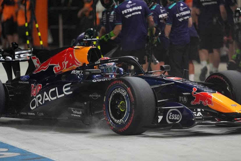 Red Bull Racing's Dutch driver Max Verstappen drives into the pit lane during the qualifying session ahead of the Formula One Singapore Grand Prix at the Marina Bay Street Circuit in Singapore on October 10, 2026.  Ng Han Guan / POOL / AFP