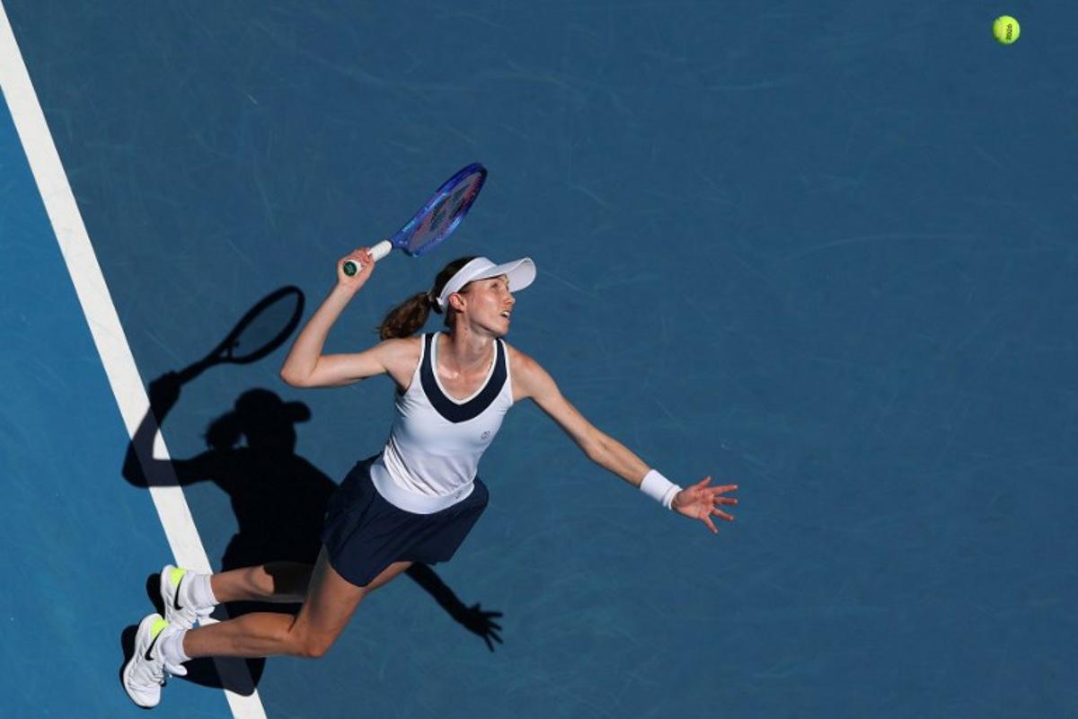 Spain's Cristina Bucsa serves to Ukraine's Elina Svitolina during their women's singles match on day one of the Australian Open tennis tournament in Melbourne on January 18, 2026.  Martin KEEP / AFP