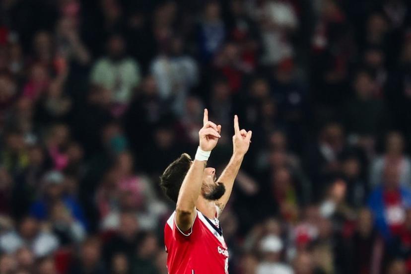 Lille's French forward #09 Olivier Giroud celebrates after scoring his team first goal during the French L1 football match between Lille LOSC and Stade Brestois 29 (Brest) at the Stade Pierre-Mauroy in Villeneuve-d'Ascq, northern France, on October 17, 2026.  Sameer AL-DOUMY / AFP