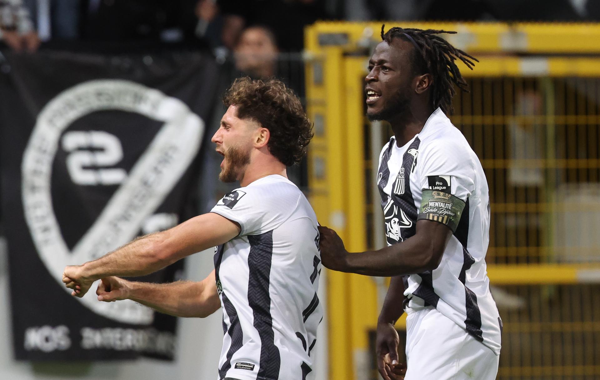 Charleroi's Parfait Guiagon and Charleroi's Antoine Bernier celebrate after scoring during a soccer match between Sporting Charleroi and FCV Dender EH, Saturday 30 August 2025 in Charleroi, on day 6 of the 2025-2026 'Jupiler Pro League' first division of the Belgian championship. BELGA PHOTO VIRGINIE LEFOUR