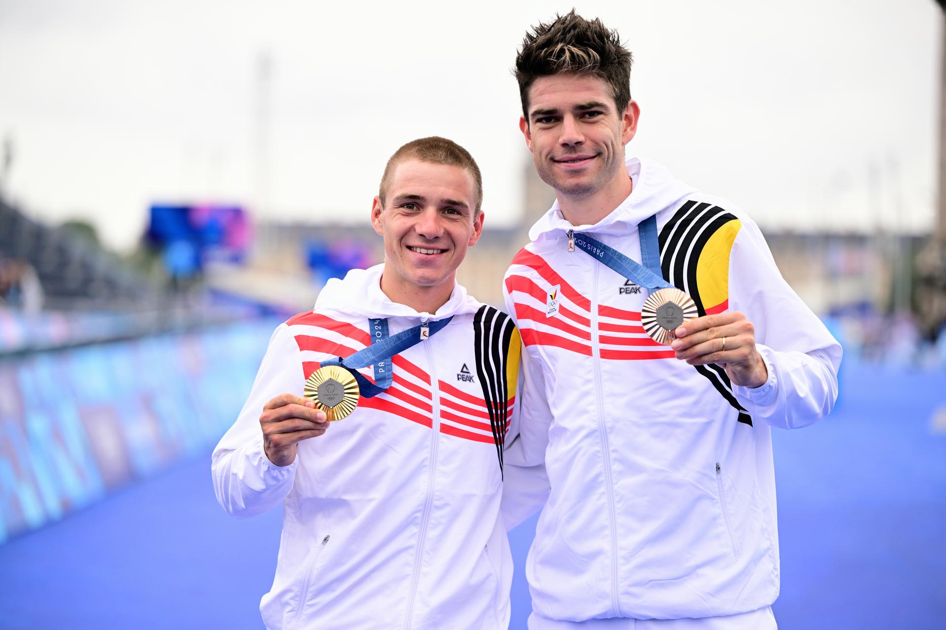 Belgian gold medallist Remco Evenepoel and Belgian bronze medallist Wout van Aert pose after the podium ceremony of the men's time trial event at the Paris 2024 Olympic Games, on Saturday 27 July 2024 in Paris, France . The Games of the XXXIII Olympiad are taking place in Paris from 26 July to 11 August. The Belgian delegation counts 165 athletes in 21 sports. BELGA PHOTO LAURIE DIEFFEMBACQ