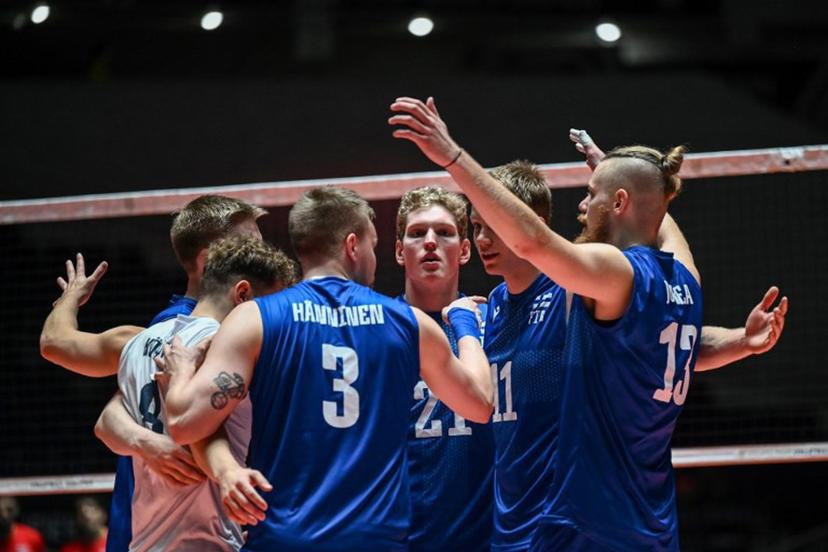 Members of Finland celebrate after a point during the match between Finland and Egypt on the final day of the Volleyball World Cup 2023 men's Olympic qualifying tournament at Yoyogi National Stadium in Tokyo on October 8, 2023.  Richard A. Brooks / AFP