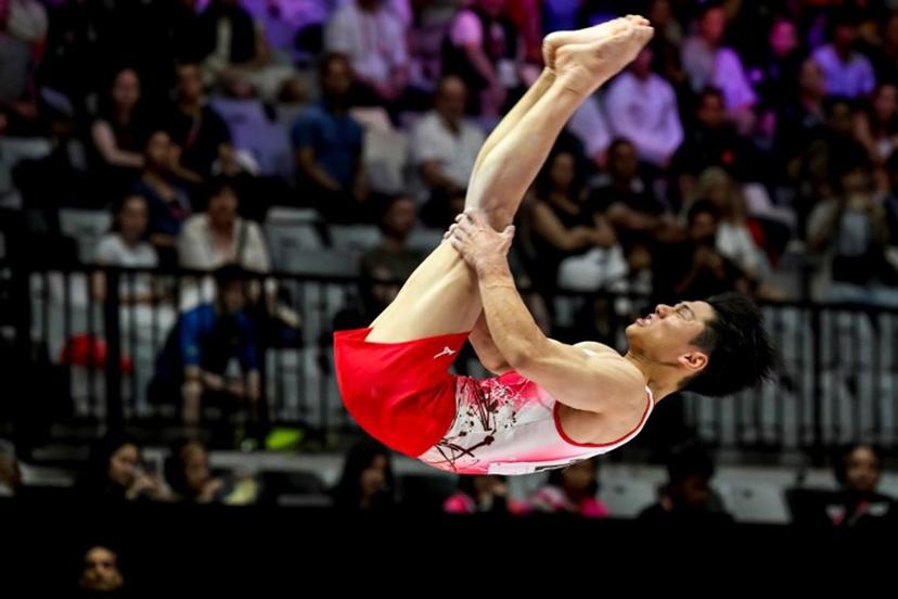 Japan's Daiki Hashimoto competes on the floor exercise during the men's all-around final at the 53rd FIG Artistic Gymnastics World Championships in Jakarta on October 22, 2025.  BAY ISMOYO / AFP