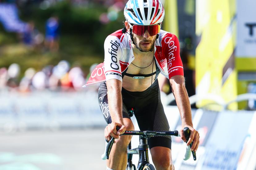 French Guillaume Martin of Cofidis pictured as he crosses the finish line at stage 15 of the 2024 Tour de France cycling race, from Loudenvielle to Plateau de Beille, France (107,7 km), on Sunday 14 July 2024. The 111th edition of the Tour de France starts on Saturday 29 June and will finish in Nice, France on 21 July. BELGA PHOTO DAVID PINTENS