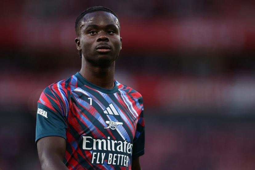 Arsenal's English midfielder #07 Bukayo Saka warms up ahead of the English Premier League football match between Arsenal and Coventry City at the Emirates Stadium in London on August 21, 2026.   Henry NICHOLLS / AFP