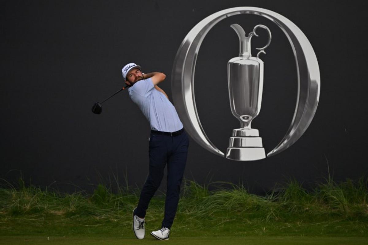 US golfer Cameron Young watches his drive from the 1st tee during practice ahead of the 153rd Open Championship at Royal Portrush golf club in Northern Ireland on July 16, 2025.  Glyn KIRK / AFP
